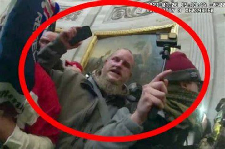 Accused Capitol rioter seen with Pelosi's nameplate surrenders
