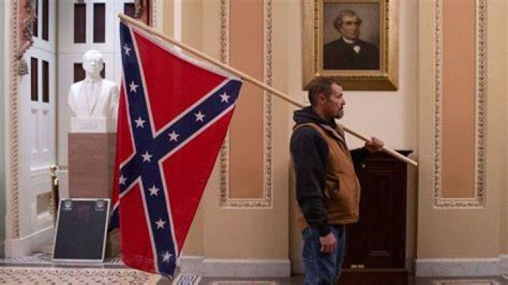 Capitol Rioter And Confederate Flag Bearer