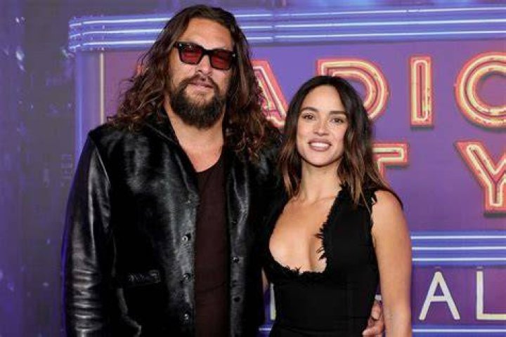 Jason Momoa, 39, and wife Lisa 51, pack on the PDA at Aquaman