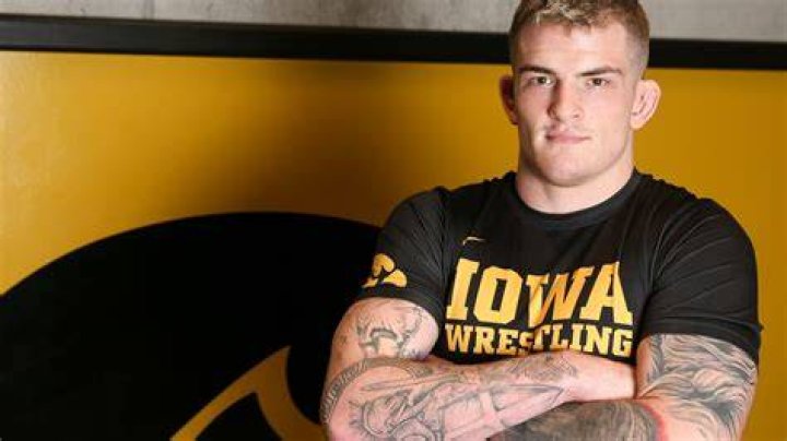 Olympic gold medal or the NFL? Ben Kueter will go for both with Iowa wrestling, football