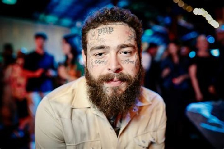 Post Malone Holds Hands With Mystery Woman During A Shopping Date