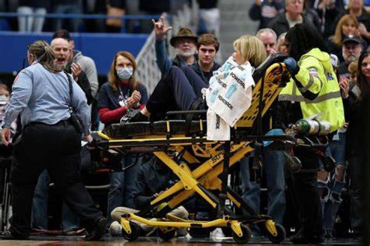 UConn associate coach stretchered off after medical emergency